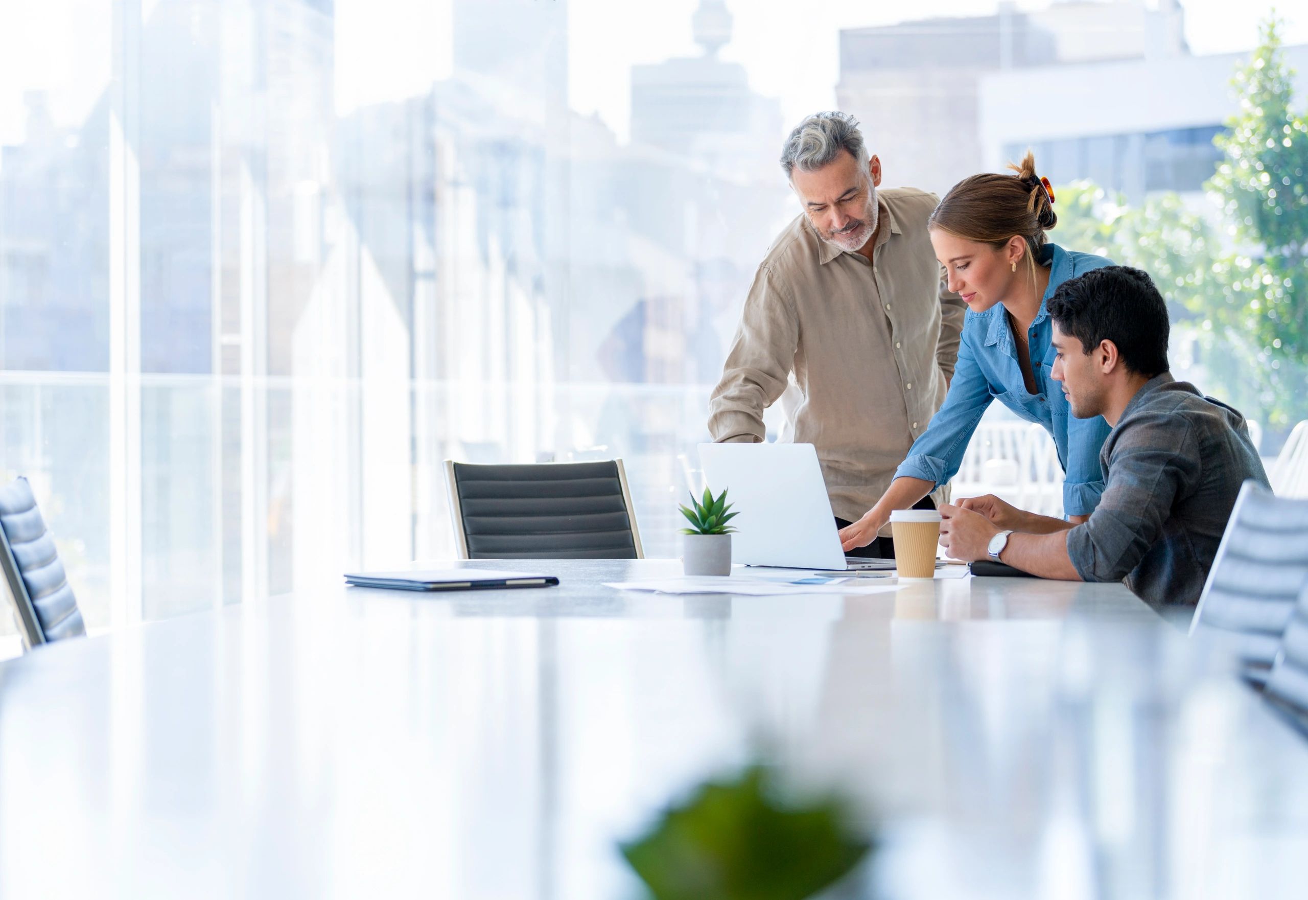 Marketing consulting team collaborating in a boardroom