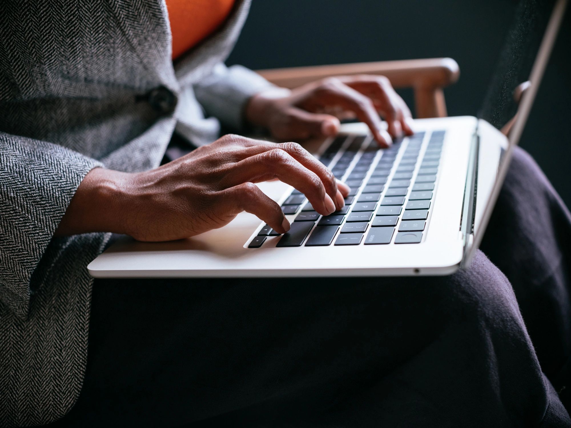 Professional working on social media strategy from a laptop